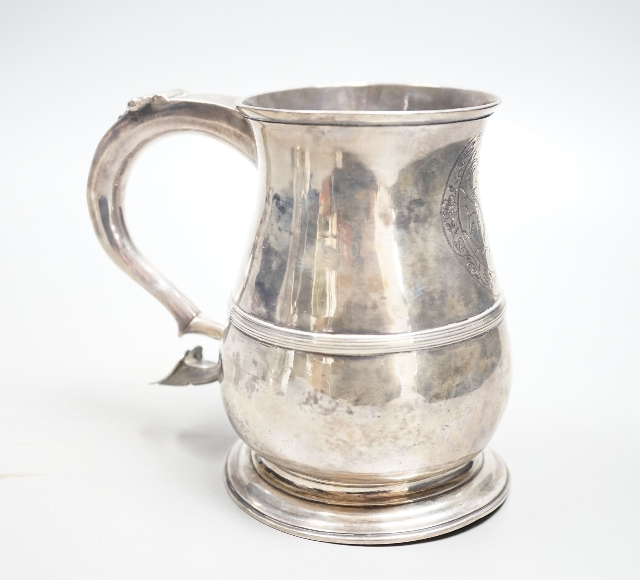 A George II silver baluster mug, with banded girdle, Benjamin Cartwright I, London, 1751, 12.2cm, 10.5oz.